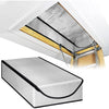 A silver attic stairway insulation cover with a sealed barrier shown installed under a white ceiling trim.