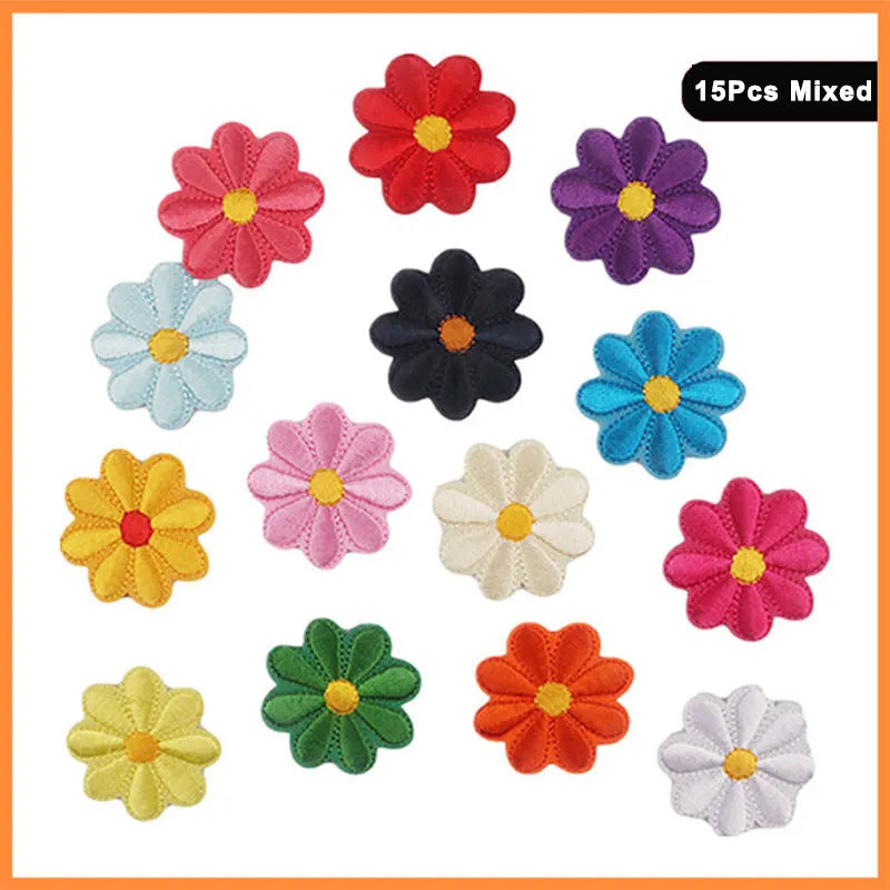 A collection of 15 mixed colored butterfly and rose embroidered iron-on patches.