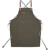 A dark olive green adjustable cotton canvas apron with multiple pockets and leather ties.