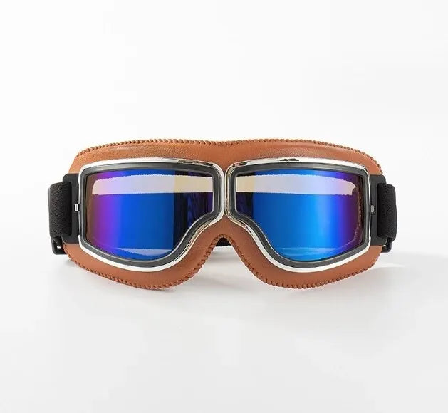 A pair of brown leather retro foldable motorcycle goggles with blue tinted lenses.