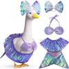 A white lawn goose statue wearing a purple iridescent mermaid bikini costume with sparkly accents.