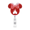 A red Mickey Mouse-themed badge reel with a sparkly bow and castle design.