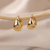 Boucles d'oreilles créoles en zircon cubique ton or