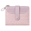 A light pink women's double-zip PU leather wallet with card slots and a flap closure.