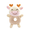 A soft plush baby rattle toy shaped like a cartoon animal with pink and beige fur and orange ears.