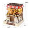 A wooden dollhouse miniature assembly kit featuring a food house display with LED lighting and a counter.
