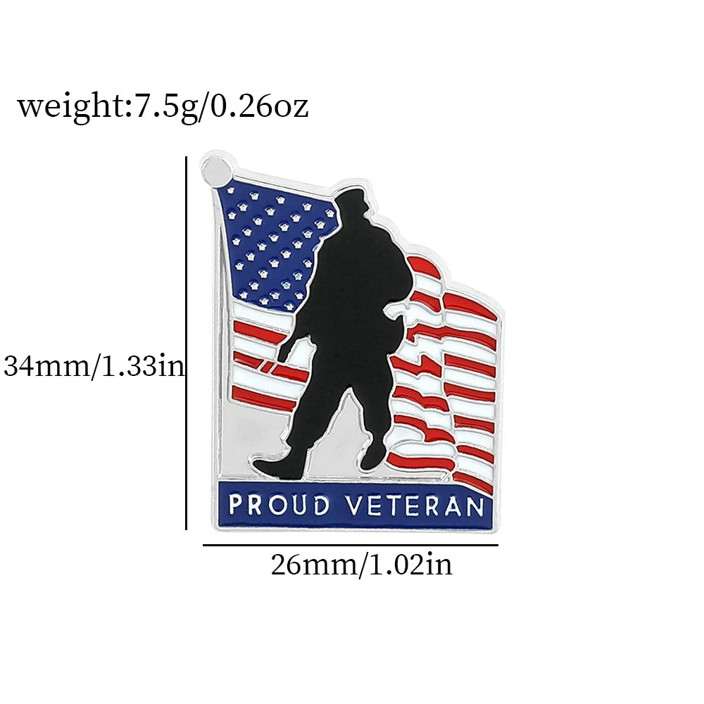 Silver enamel pin featuring a silhouette of a soldier against an American flag background with the text PROUD VETERAN
