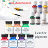 A collection of Angelus leather pigment dyes in various colors including gold, rose, green, blue, purple, and silver bottles.