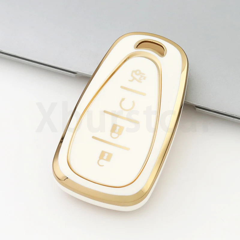 A white and gold durable TPU key fob cover for a Chevrolet vehicle.