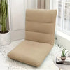 A beige foldable floor sofa cover for a single seat or lounger resting on a white surface.