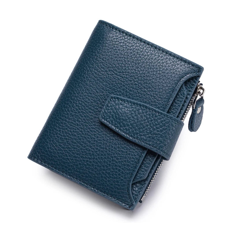 A dark teal genuine leather RFID blocking bi-fold wallet shown from above.