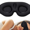 A black 3D contoured silk-touch sleep mask is shown being worn by a person.
