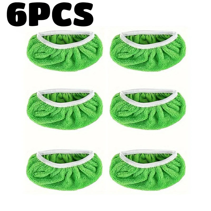 Six reusable green microfiber mop refill pads shown in various forms.