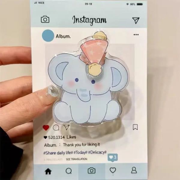 Sujetador magnético en forma de elefante para teléfono, claro y lindo, mostrado en una pantalla de Instagram.