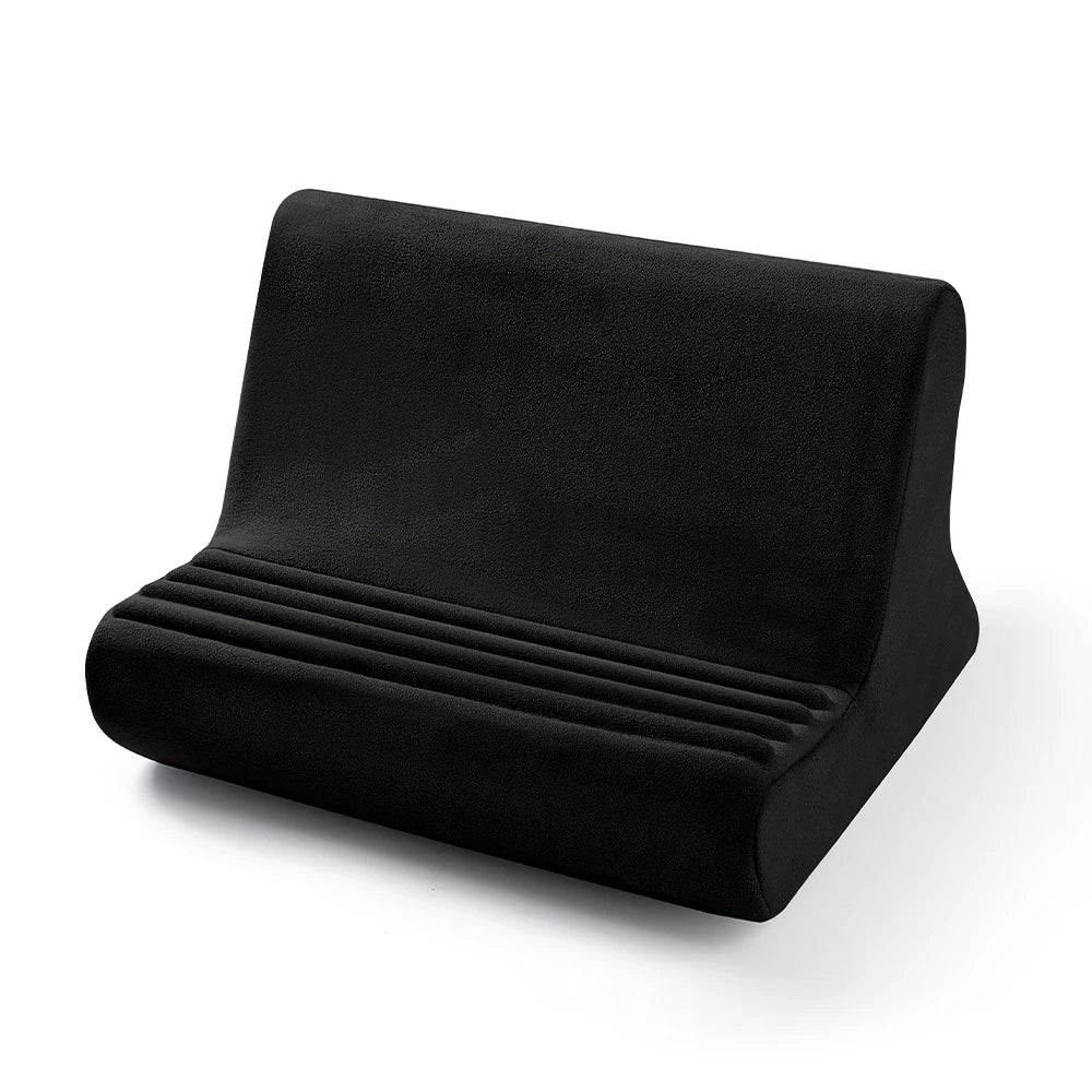 A black adjustable comfort tablet and phone stand pillow with ribbed texture.