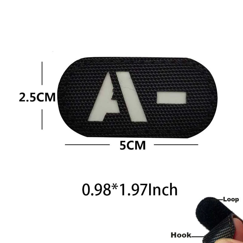 Black glow-in-the-dark blood type tactical patch with hook and loop backing