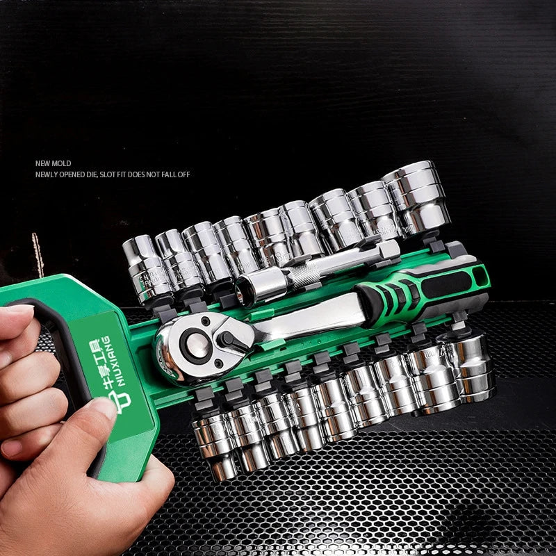 A hand holds a green chrome vanadium socket set with a quick-release ratchet, showing the tool's size and features.