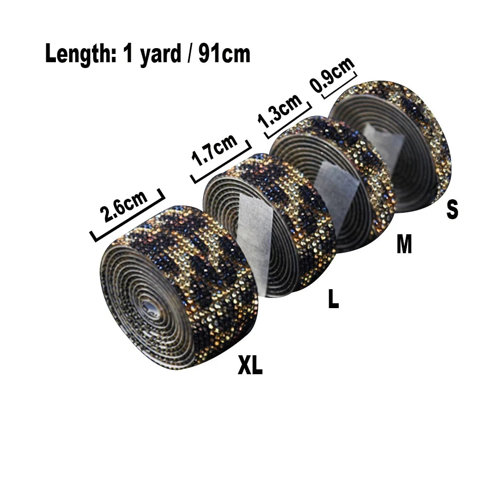 Roll of crystal rhinestone ribbon stickers in various sizes labeled S, M, L, and XL with corresponding measurements.