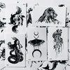 Colección de pegatinas de tatuajes temporales con diseños de león, luna creciente y elementos florales.