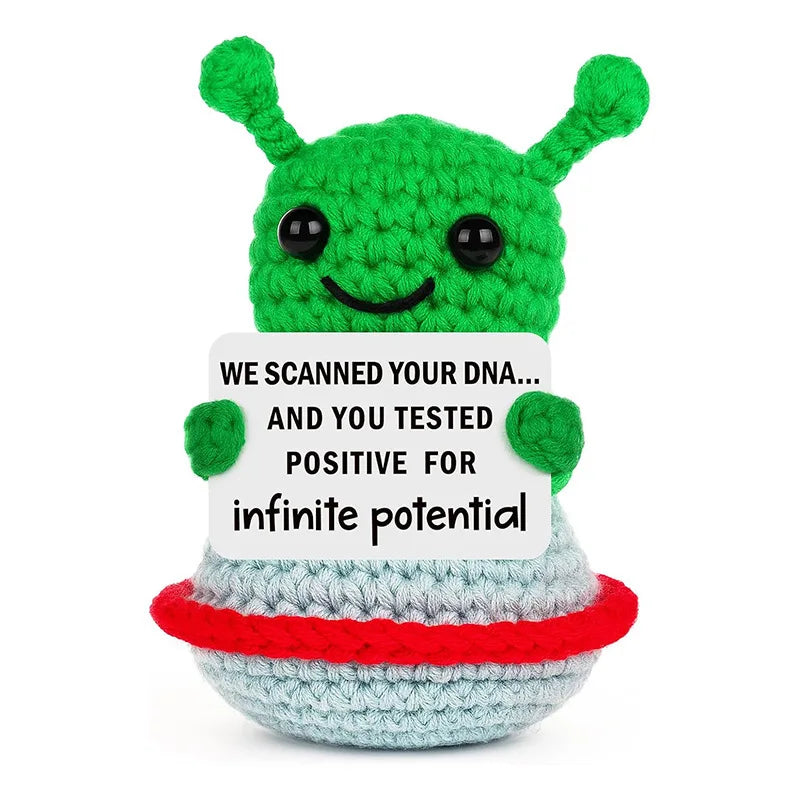 Handmade crochet green hedgehog doll with an inspirational card