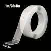 Roll of 1m/39.4in double-sided tape with a 2cm/0.79in strip shown on a black background.