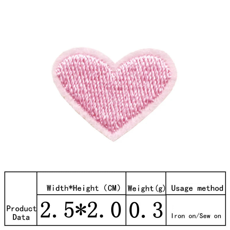 A pink heart shaped embroidered iron-on patch with a crosshatch texture.