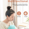A woman is using a light blue multifunctional neck pillow for support while working on a laptop.