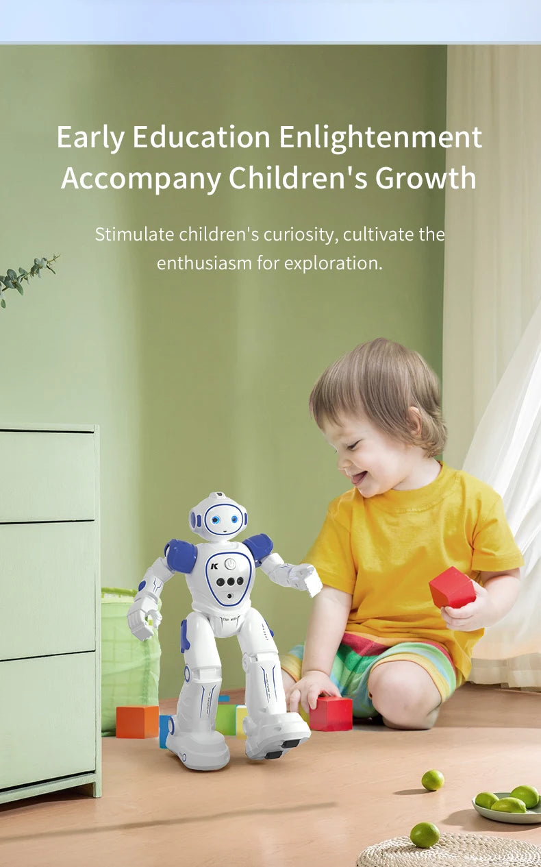 A young child is interacting with a white robot toy on the floor in a bright room.