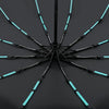 A black umbrella with light blue glowing ribs spread out against a dark background.