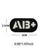 Black glow-in-the-dark blood type tactical patch with hook and loop backing