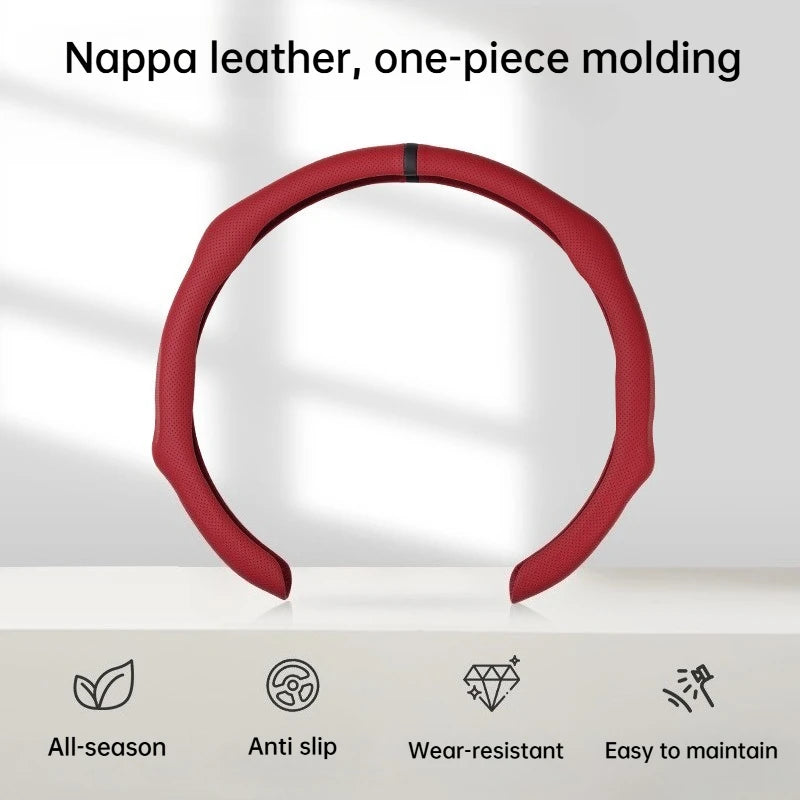 A red Nappa leather one-piece molding steering wheel cover shown on a white surface.