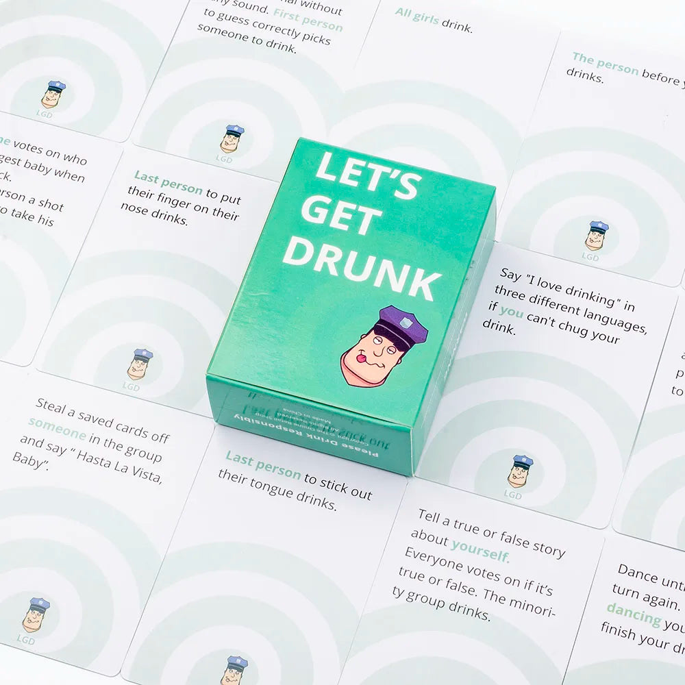 A green box of Let's Get Drunk drinking cards with a cartoon face illustration.