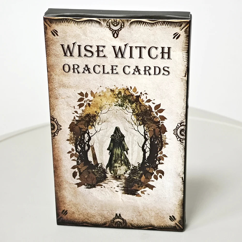 A box of Wise Witch Oracle Cards featuring an illustration of a figure within a leafy archway.