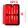 A set of six stainless steel dental care tools, including spoons and picks, packaged in a black case.