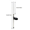 A tall, slender solar bubble garden light with a black base and a white cylindrical light element.