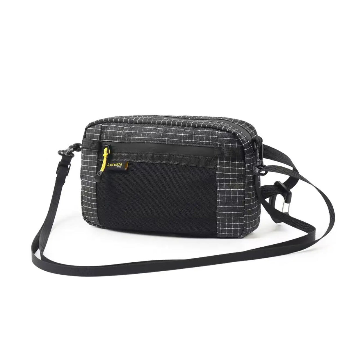 A black and gray plaid waterproof tactical waist bag with a black strap.