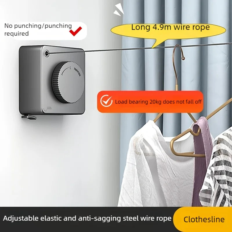 A gray retractable clothesline with a long wire rope is shown hanging laundry against a light blue curtain.