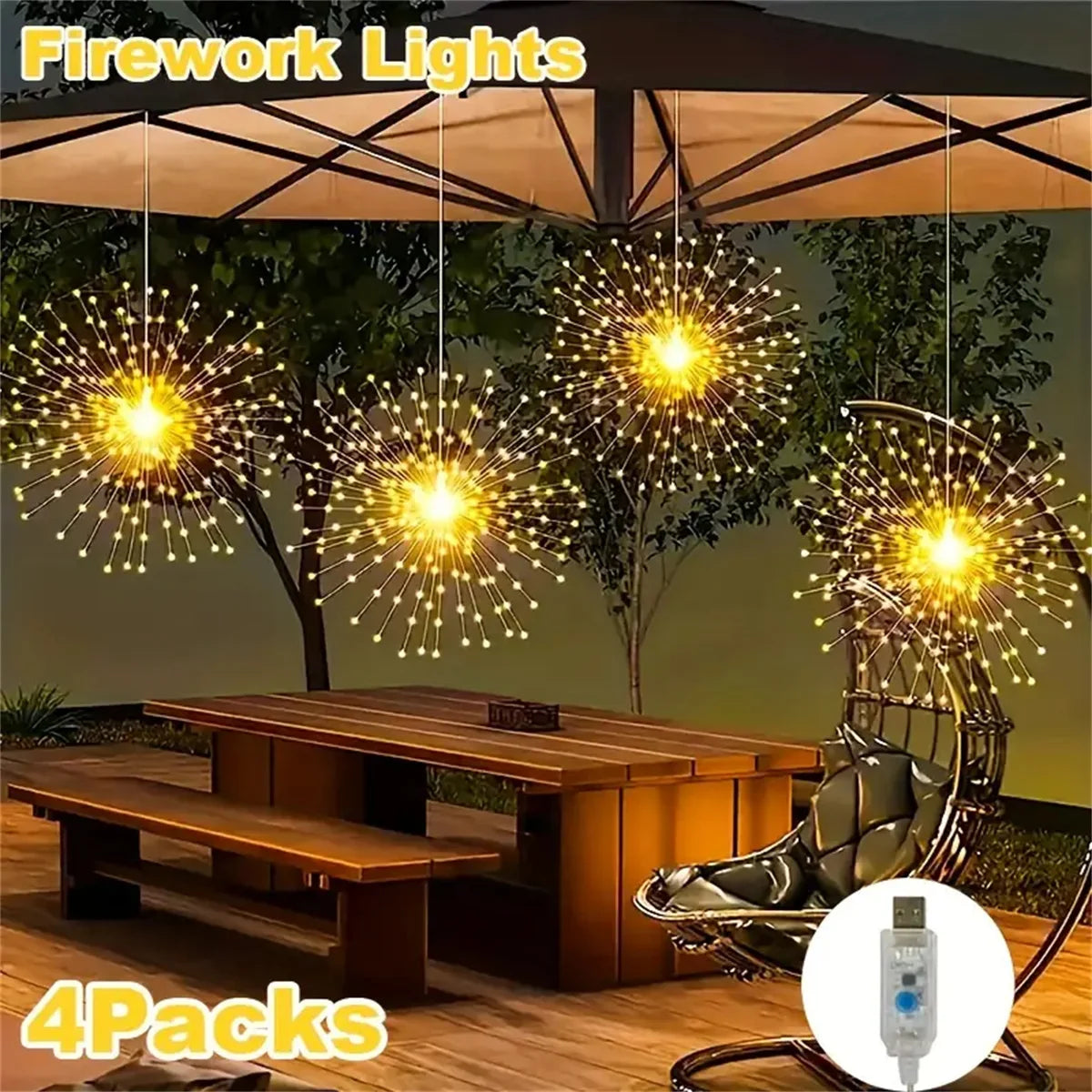 Four packs of USB-powered LED fireworks lights illuminating a garden setting.