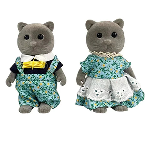 A pair of gray forest animal miniature dolls dressed in floral dresses and collars.