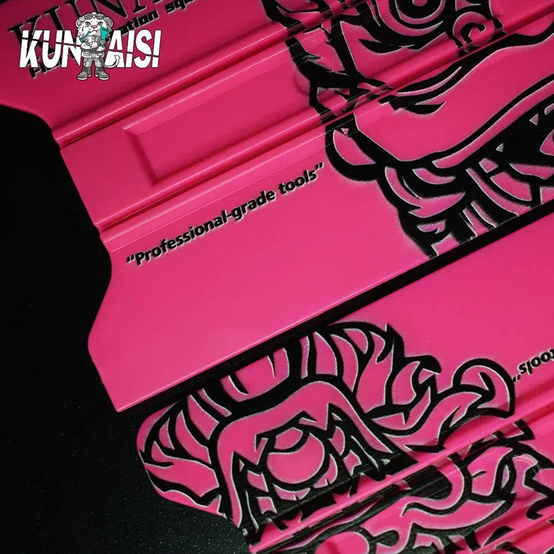 A pink magnetic suede edge squeegee tool with black graphic design for vinyl wrap and window tinting.