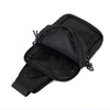 Black compact canvas crossbody bag shown open with a strap attached