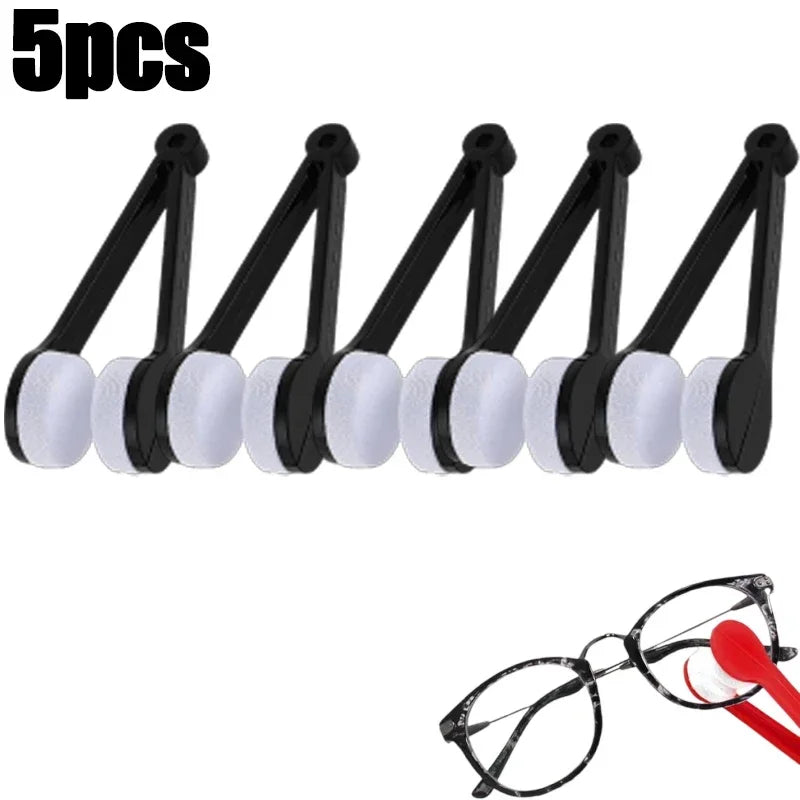 Five black microfiber tools used for cleaning eyeglasses.