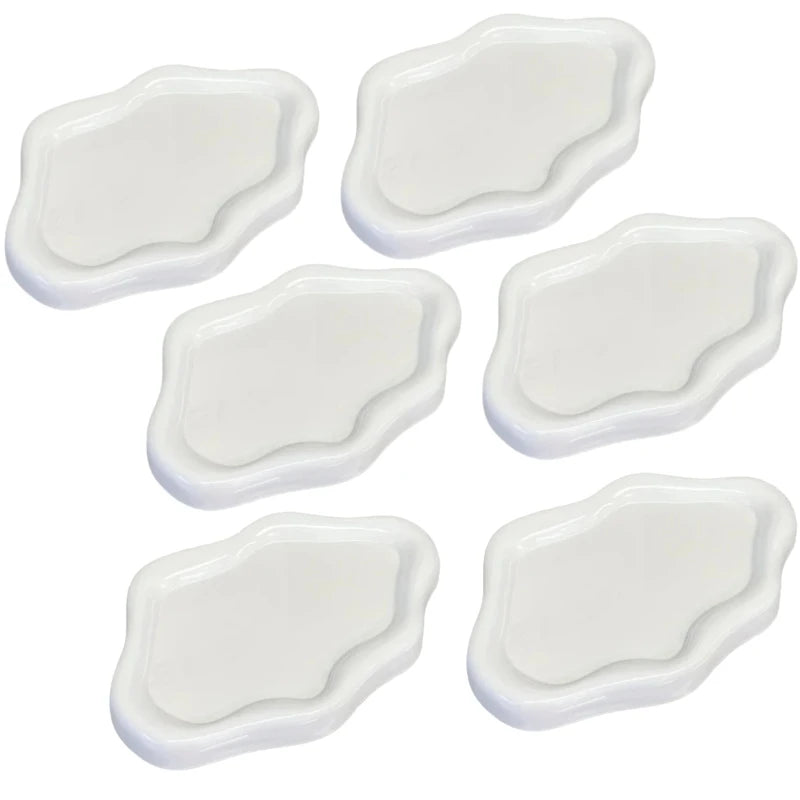A set of white cloud-shaped jewelry trays.