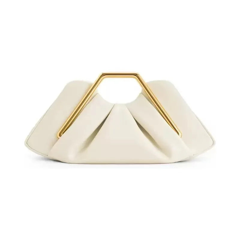 A beige soft PU leather crossbody bag with a triangular flap and gold hardware.
