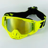 Yellow motorcycle goggles with a black strap and clear lenses are displayed against a white background.