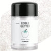 A glass jar of Silver Gray edible glitter powder with a black cap and a strawberry illustration.
