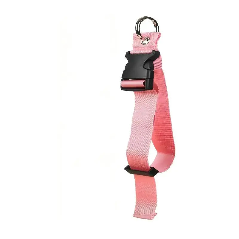 Pink adjustable travel luggage strap and belt with a black buckle