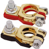 A pair of quick-release copper car battery terminals with red and black insulation and silver nuts.