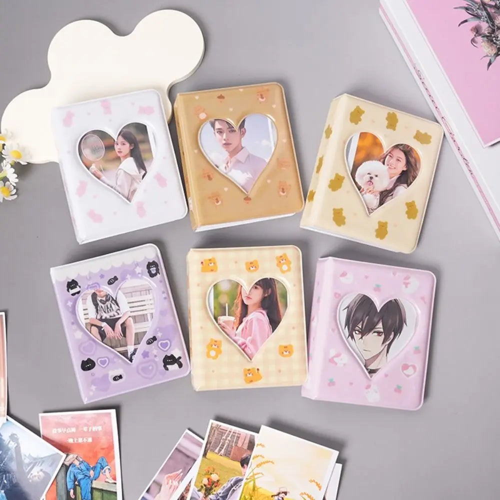 A collection of cute bear photo albums with heart cutouts for 3-inch photos and cards in various pastel colors.