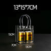 Clear PVC gift tote bags with hand loops containing two gold-colored cylindrical cans